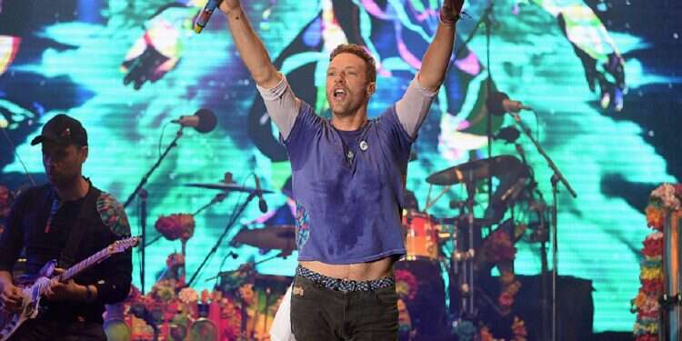 WATCH: Israeli hostages' solidarity tag displayed to thousands at Coldplay concert