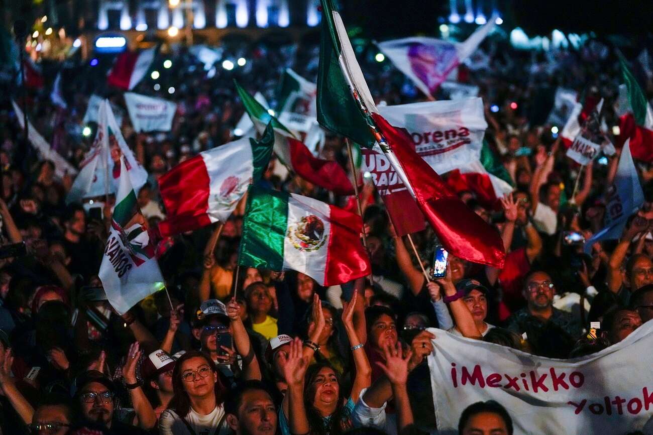 Supporters of ruling party presidential candidate Claudia Sheinbaum celebrate at the Zocalo, Mexico City's main square, June 3, 2024 (AP Photo/Matias Delacroix)