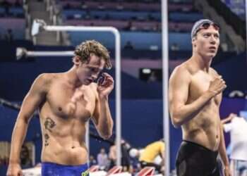 Jon Jøntvedt and Henrik Christiansen after the men's 800m freestyle heats at the Paris Olympics