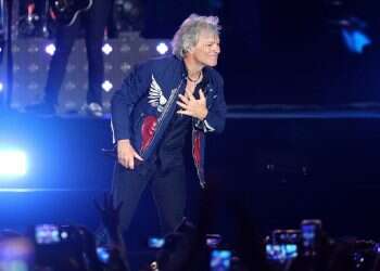 True guitar hero: Jon Bon Jovi aids distressed woman on Nashville bridge