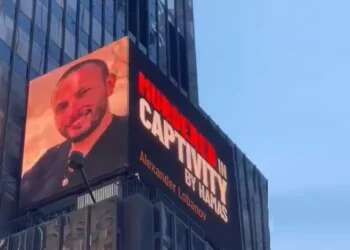 In touching tribute, images of murdered hostages displayed at Times Square