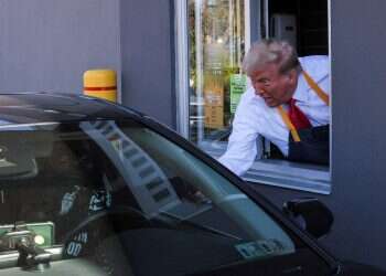 Trump serves fries at McDonald's in campaign stop