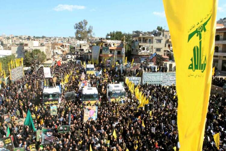 Mourners attend the funeral on February 28, 2025 of 95 Hezbollah terrorists, in the southern Lebanese border town of Aitaroun (Photo: Mahmoud Zayyat / AFP)