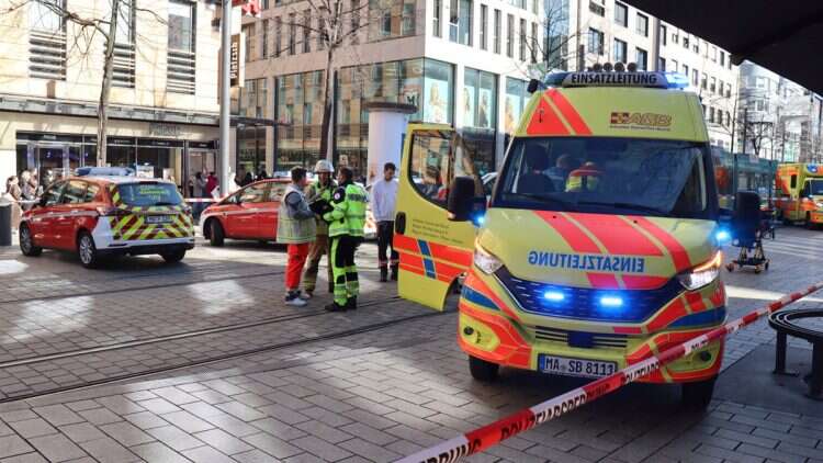 Emergency services and police stand at Paradeplatz in Mannheim, Germany, after a serious incident, Monday March 3, 2025.