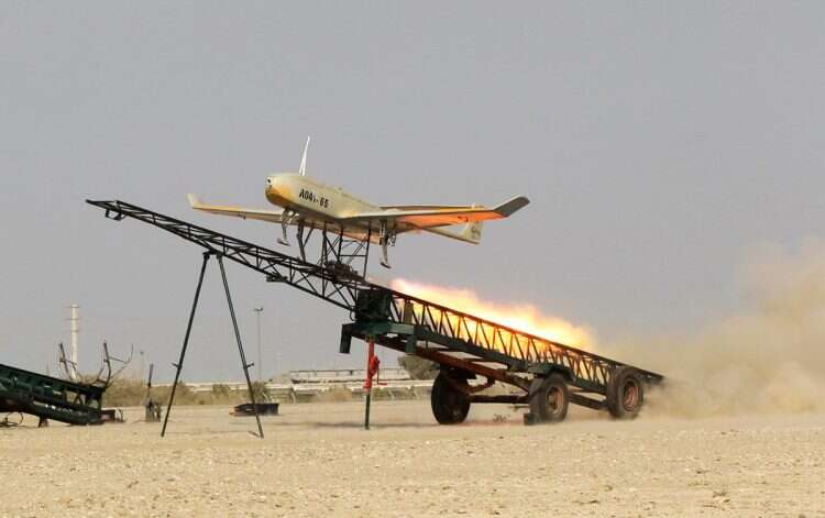 In this picture released by Jamejam Online on Thursday, Dec. 25, 2014, an Iranian made drone is launched during a military drill in Jask port, southern Iran